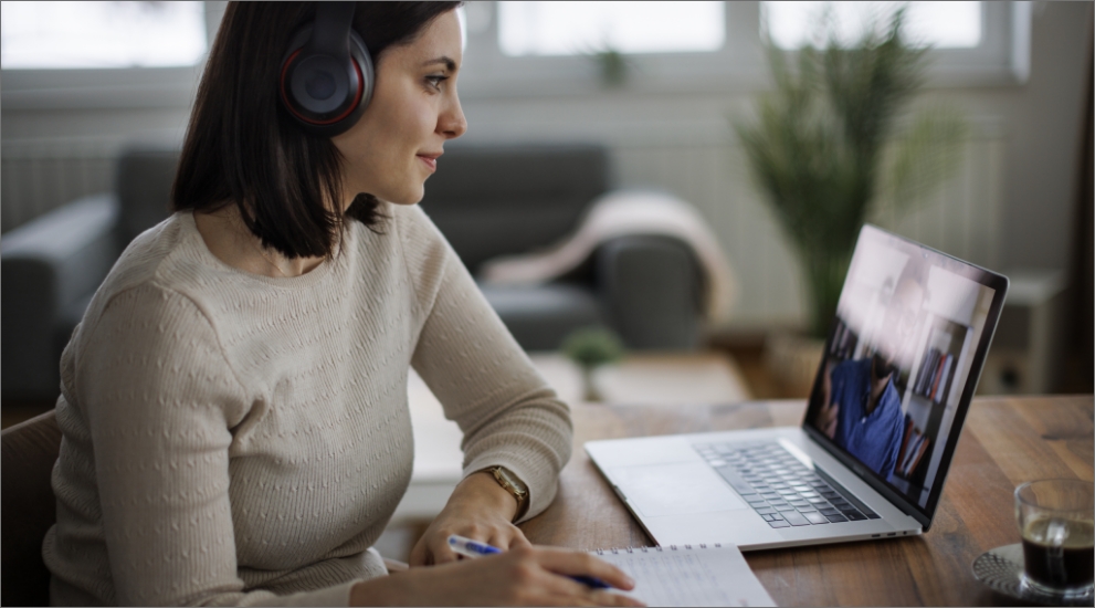 woman on webinar computer