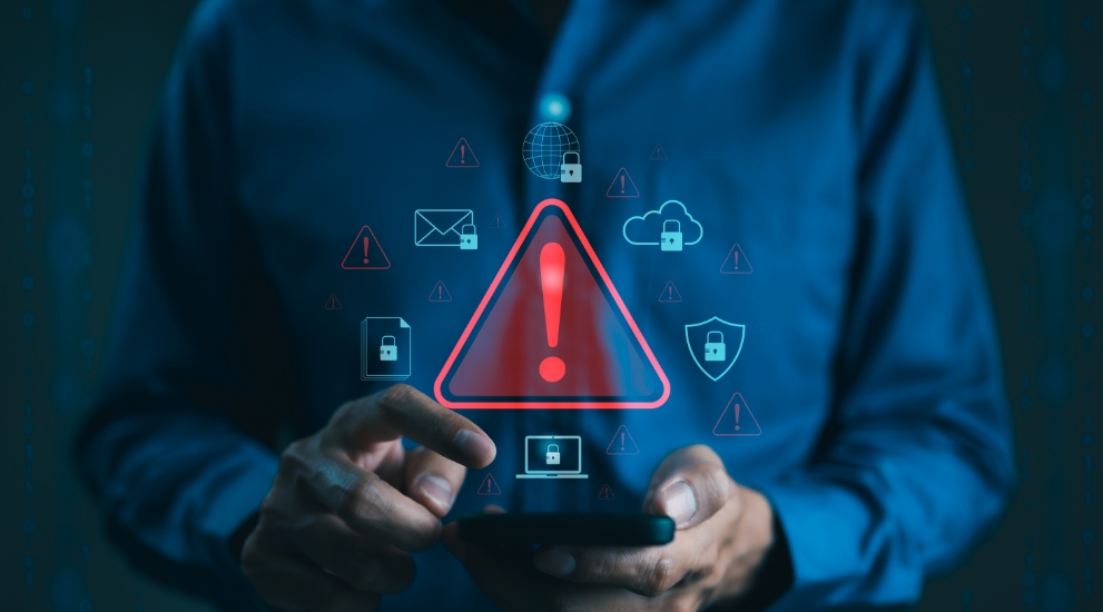 man with alert icons on phone
